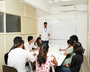 Best German Language Institute in Kochi: A modern German institute in Kochi, with students and teachers engaged in various activities, showcasing the institute's best practices.