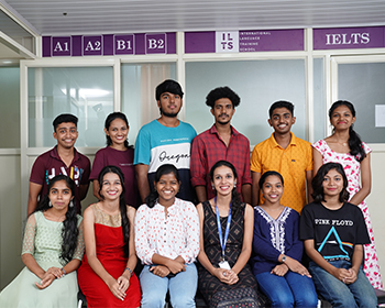 German Language Institute in Kochi: A German language institute in Kochi, with students and teachers working together.